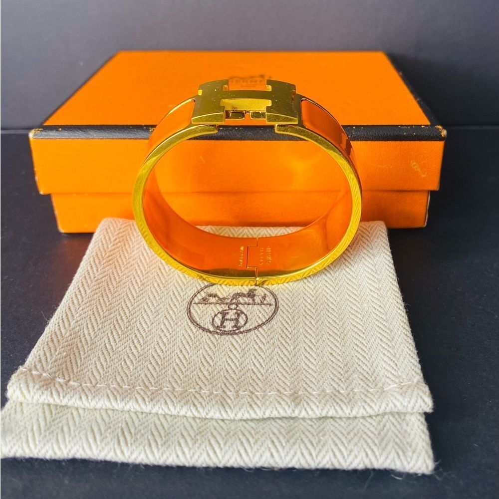 HERMES Signature Orange Enamel and Gold Plated Clic-Clac H GM Wide Bracelet